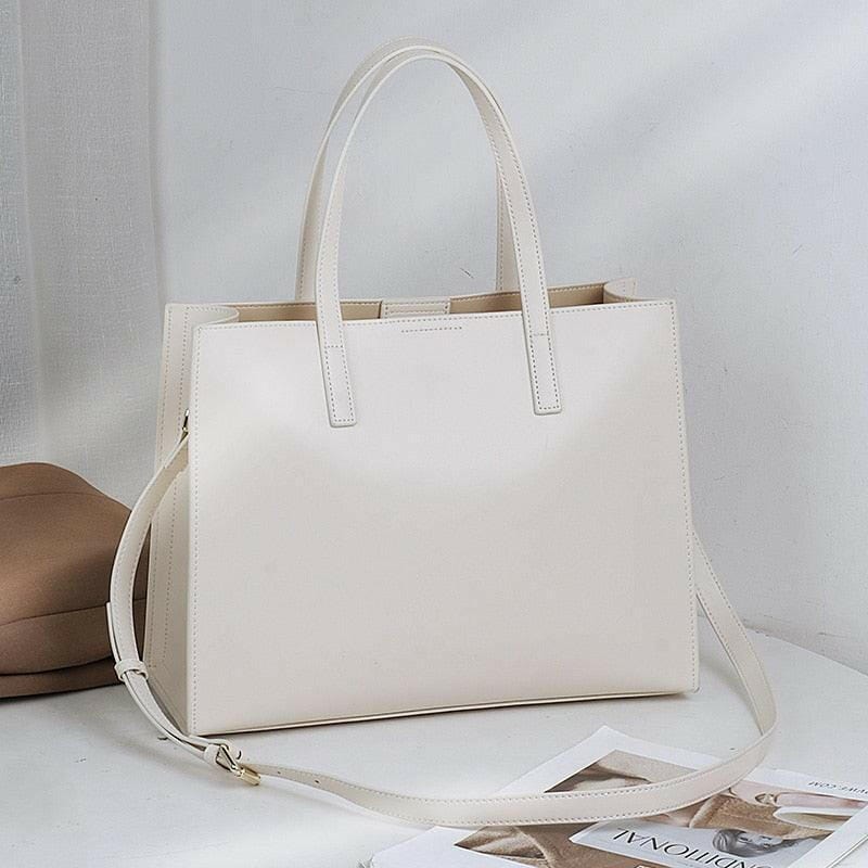 Classic Leather Handbag with Timeless Design and Spacious Interior