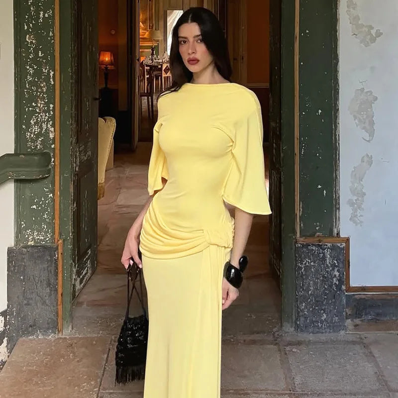 Ruched yellow maxi dress with open back for elegant events