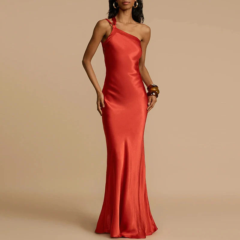 Elegant satin gown styled for an evening look with minimal accessories”