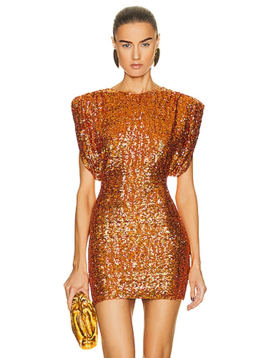 A woman wearing a sequined O-neck mini dress in a chic, modern style.