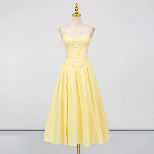 Yellow corset sleeveless party dress styled for summer events